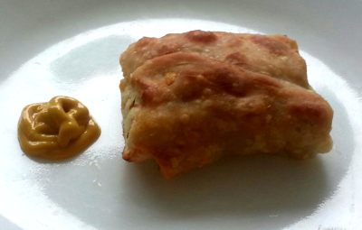 Knish with mustard